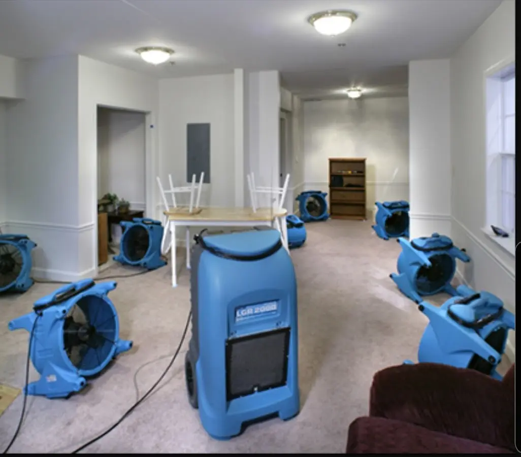 Air movers and dehumidifier setup for Water Extraction & Removal in Suffield